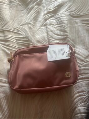 lululemon athletica Dusty Rose Cosmetic Pouch with Gold Logo